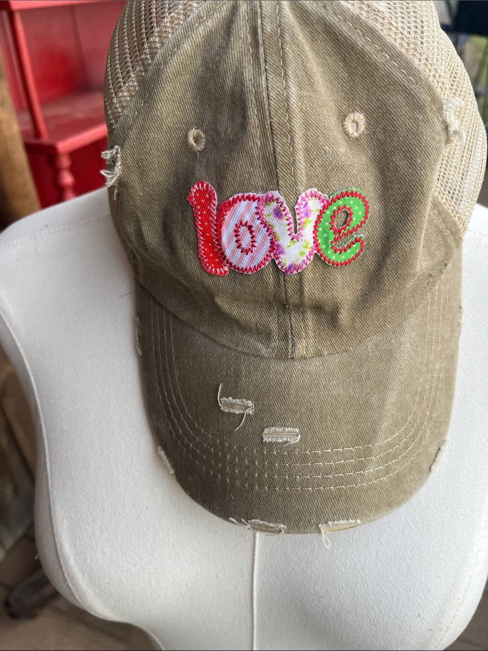 LOVE cap has Velcro back adjustable closure customer service